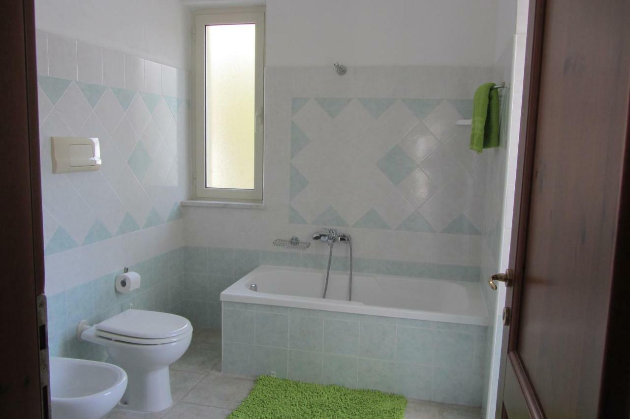Casa Rosa Apartment Cala Gonone Bagian luar foto