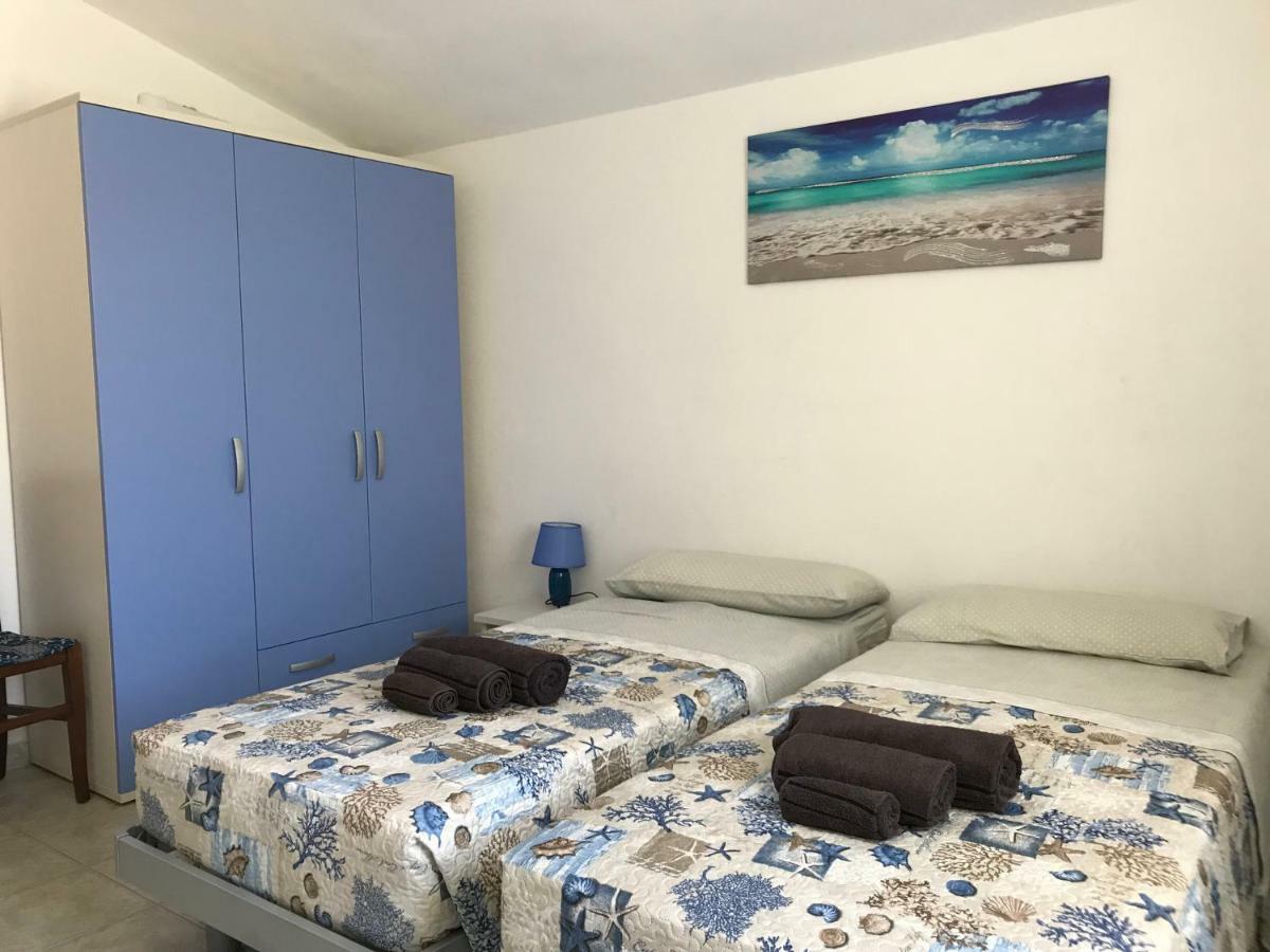 Casa Rosa Apartment Cala Gonone Bagian luar foto