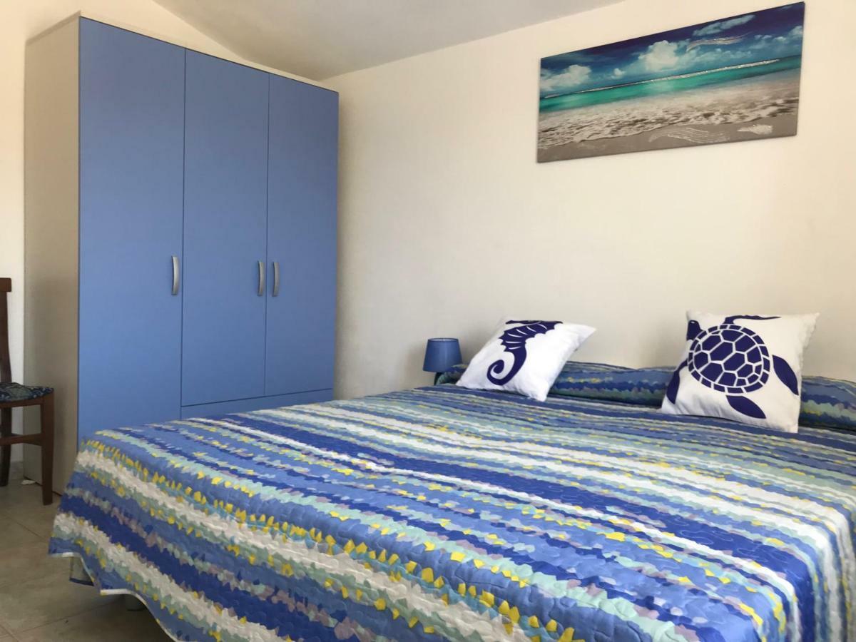 Casa Rosa Apartment Cala Gonone Bagian luar foto